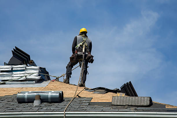 Professional Gutter Installation technician working in Hollsopple, PA